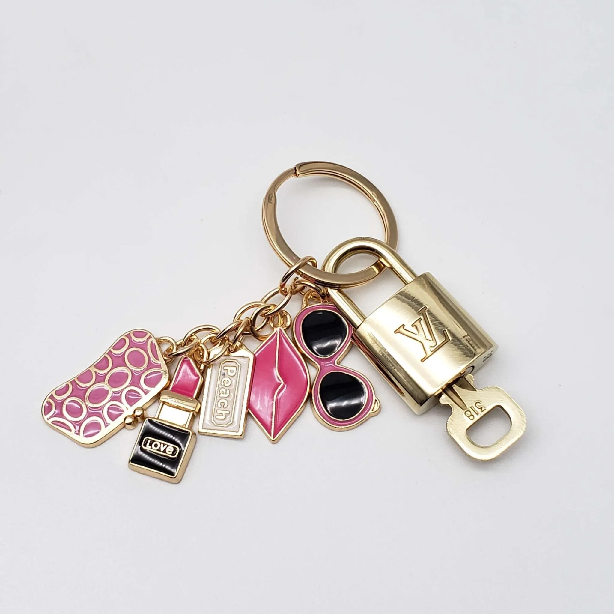 100%  Louis Vuitton Lock and Key with Unbranded Keychain, Keycharm, Bagcharm
