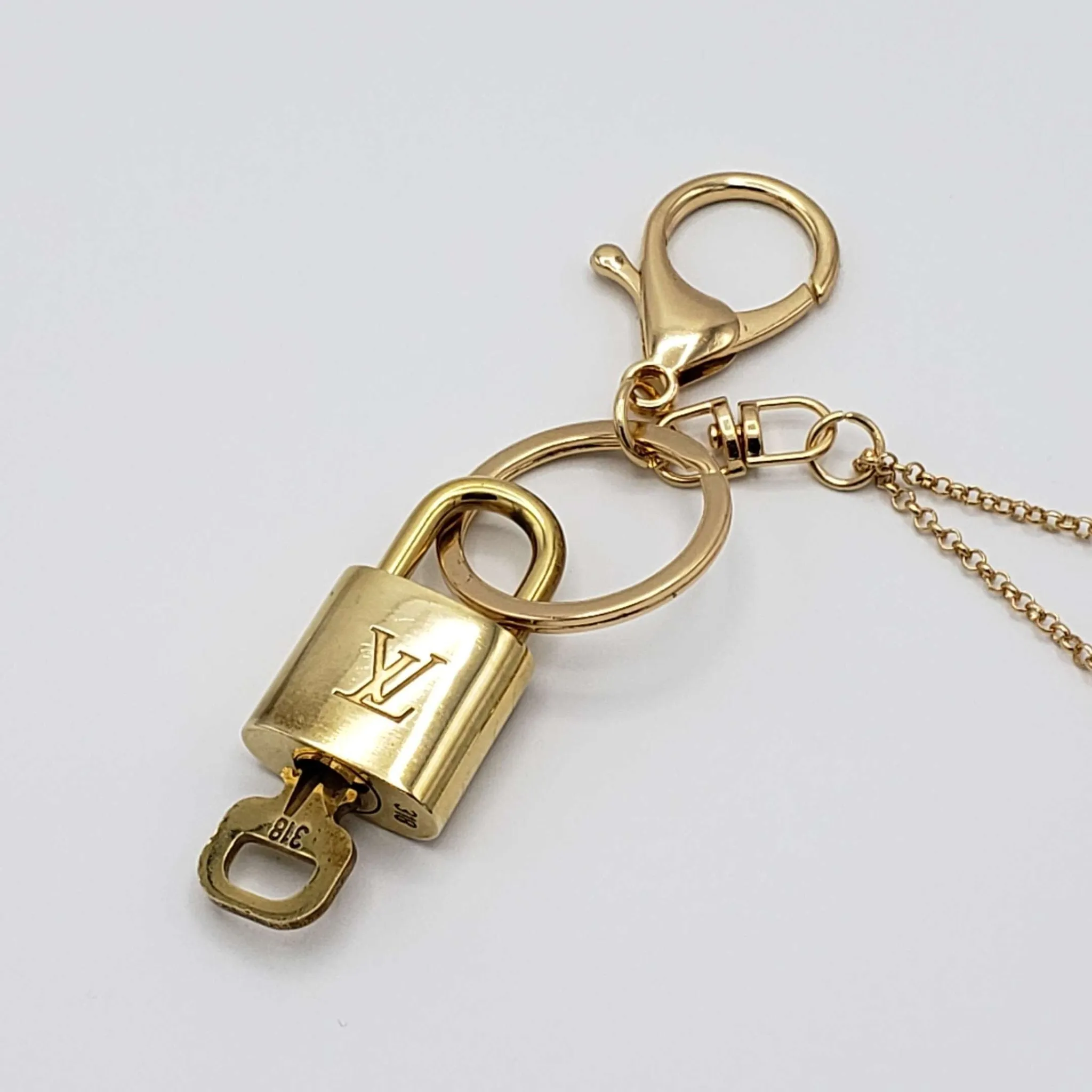 100%  Louis Vuitton Lock and Key with Unbranded Keychain, Keycharm, Bagcharm