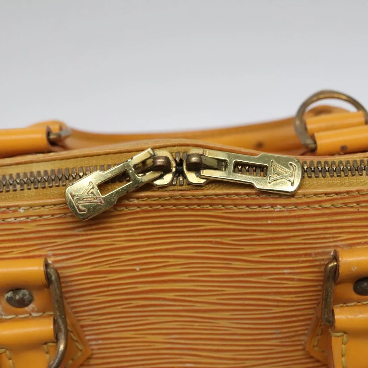 Alma Epi Leather Handbag