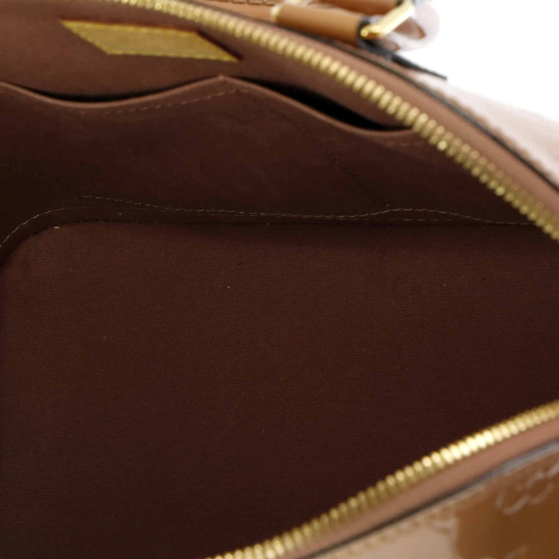 Alma Handbag Monogram Vernis PM