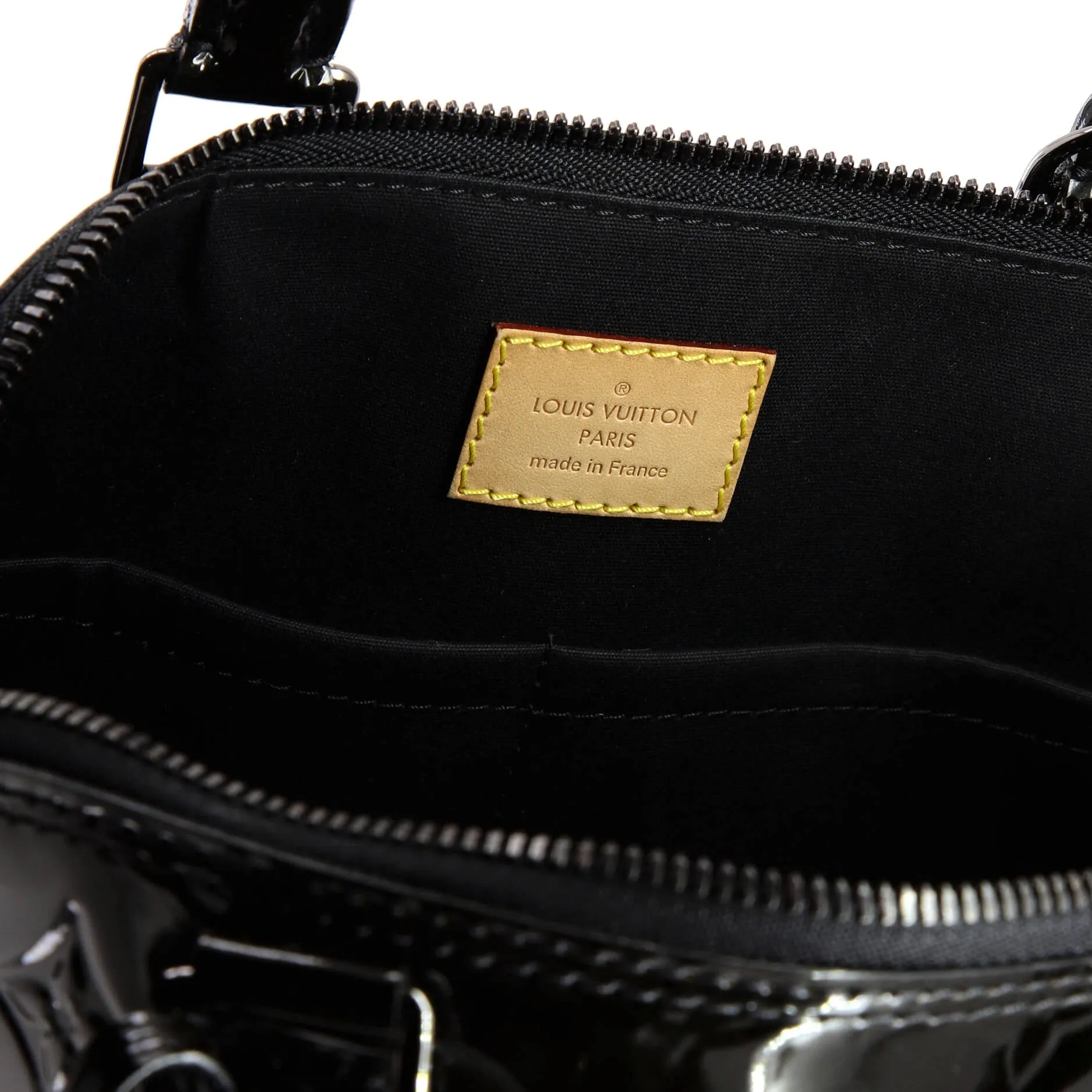 Alma Handbag Monogram Vernis PM