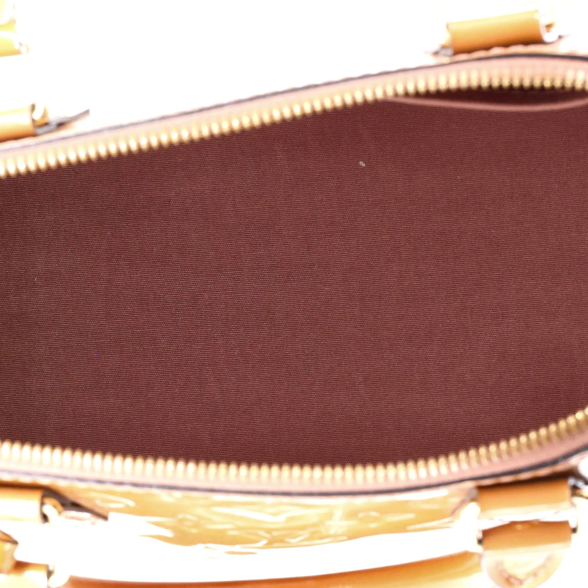 Alma Handbag Monogram Vernis PM