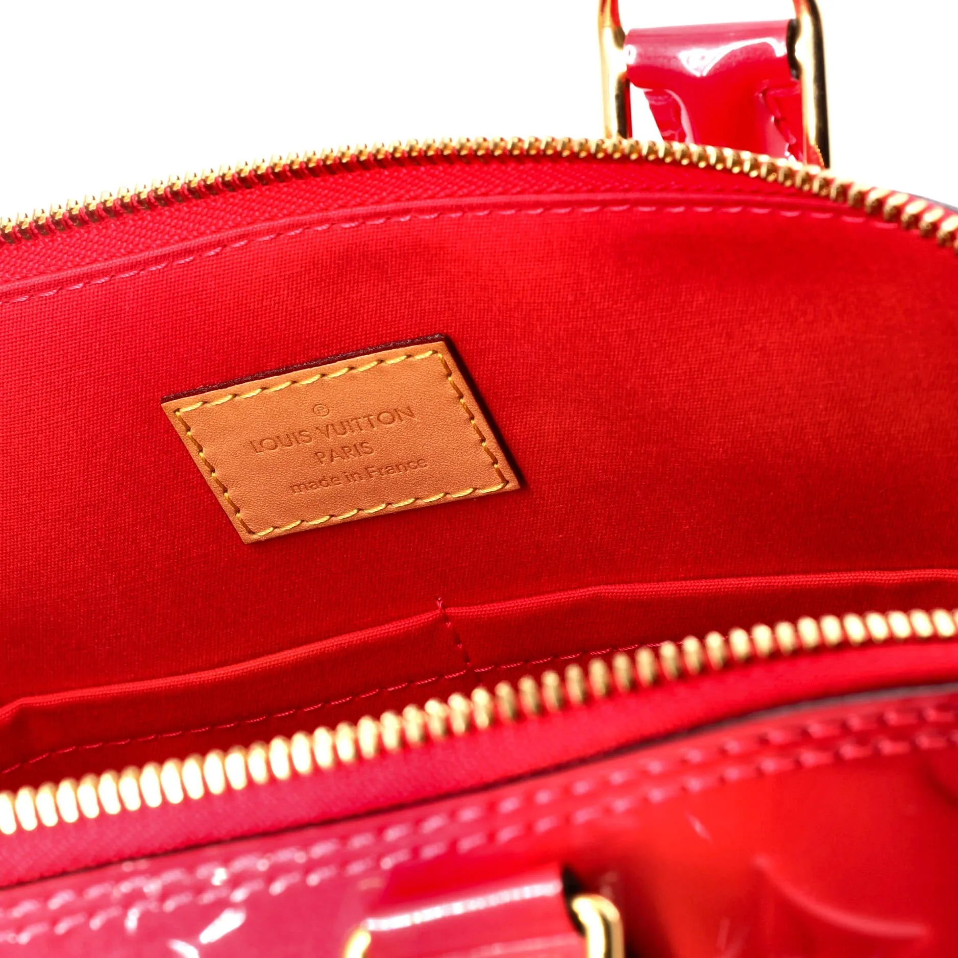 Alma Handbag Monogram Vernis PM