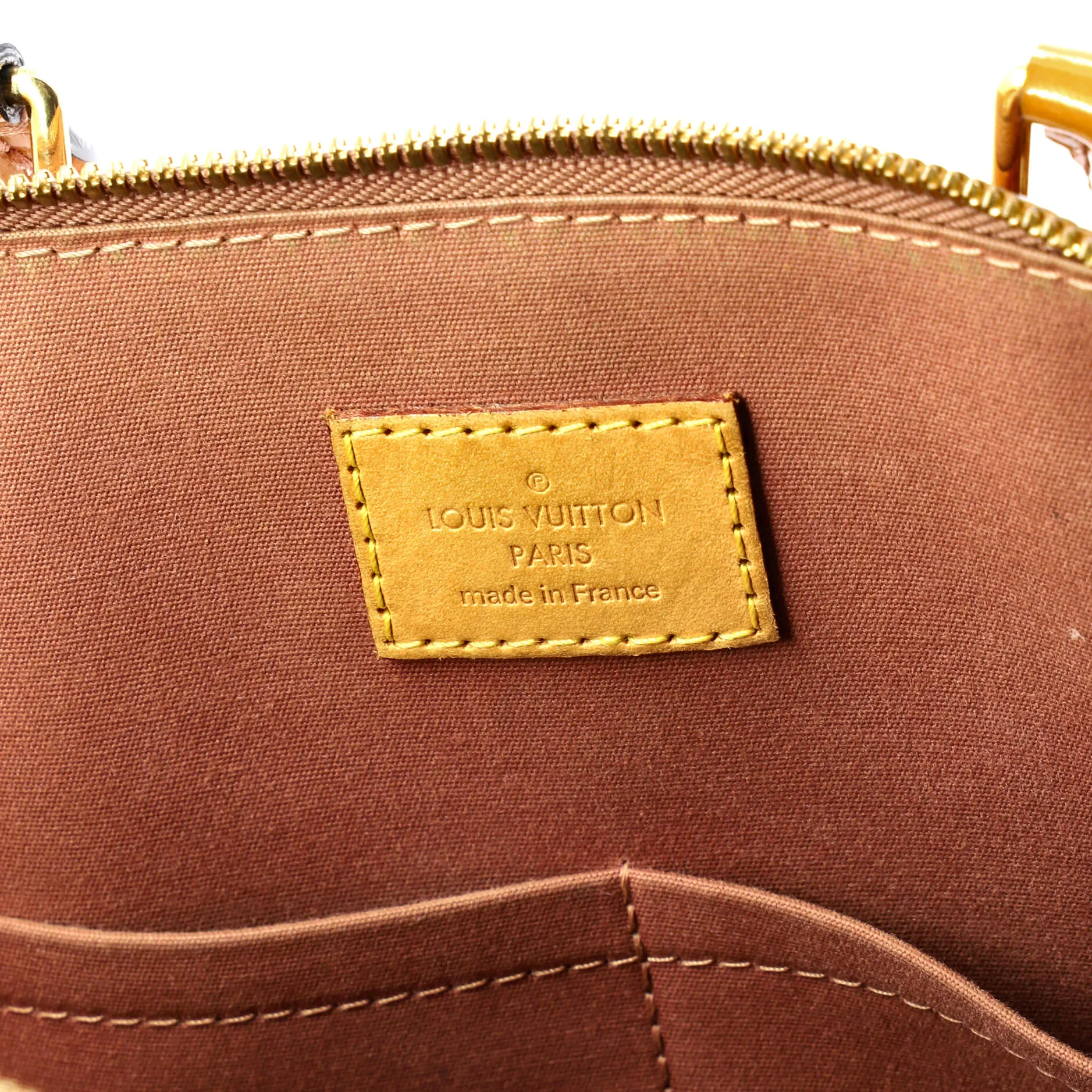 Alma Handbag Monogram Vernis PM