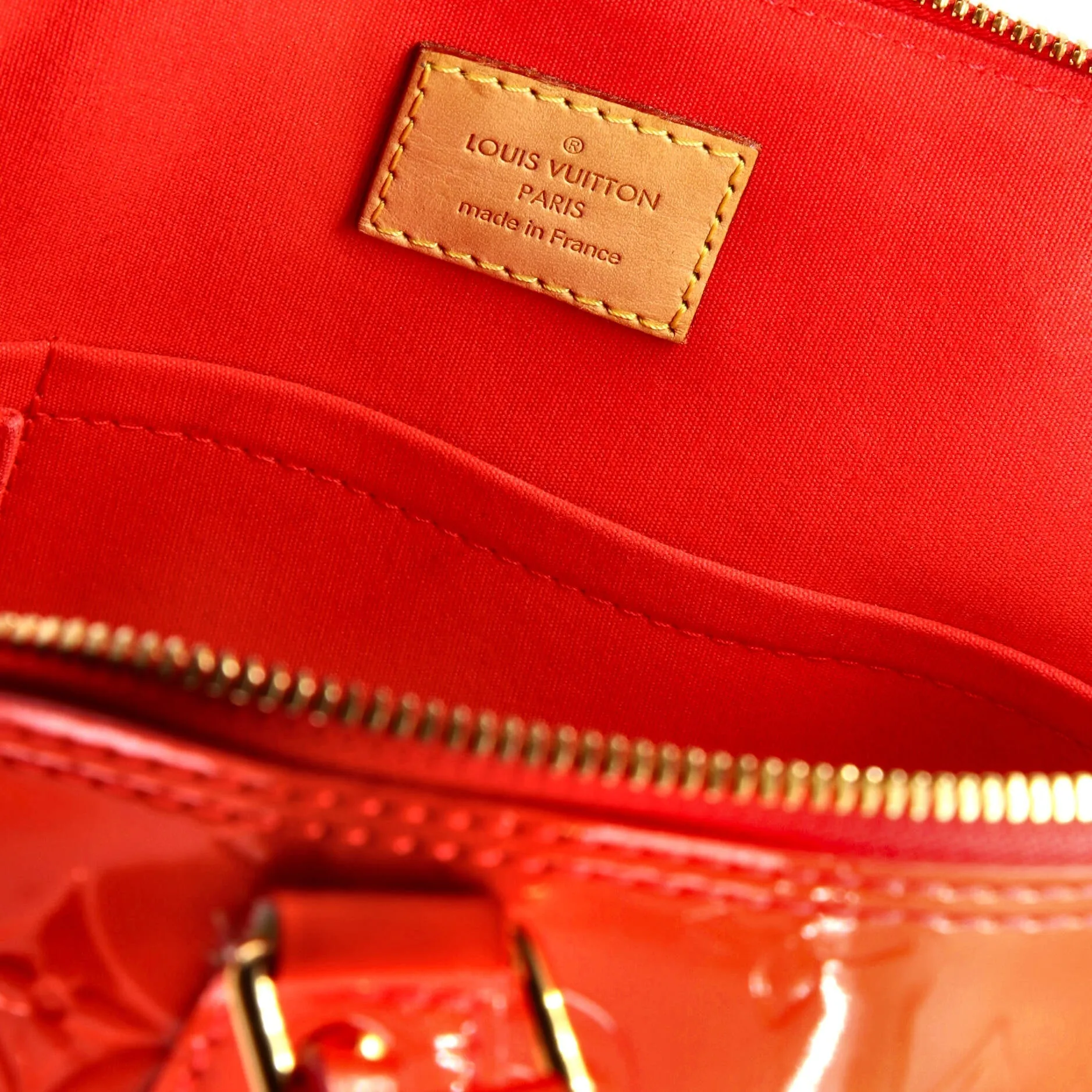 Alma Handbag Monogram Vernis PM