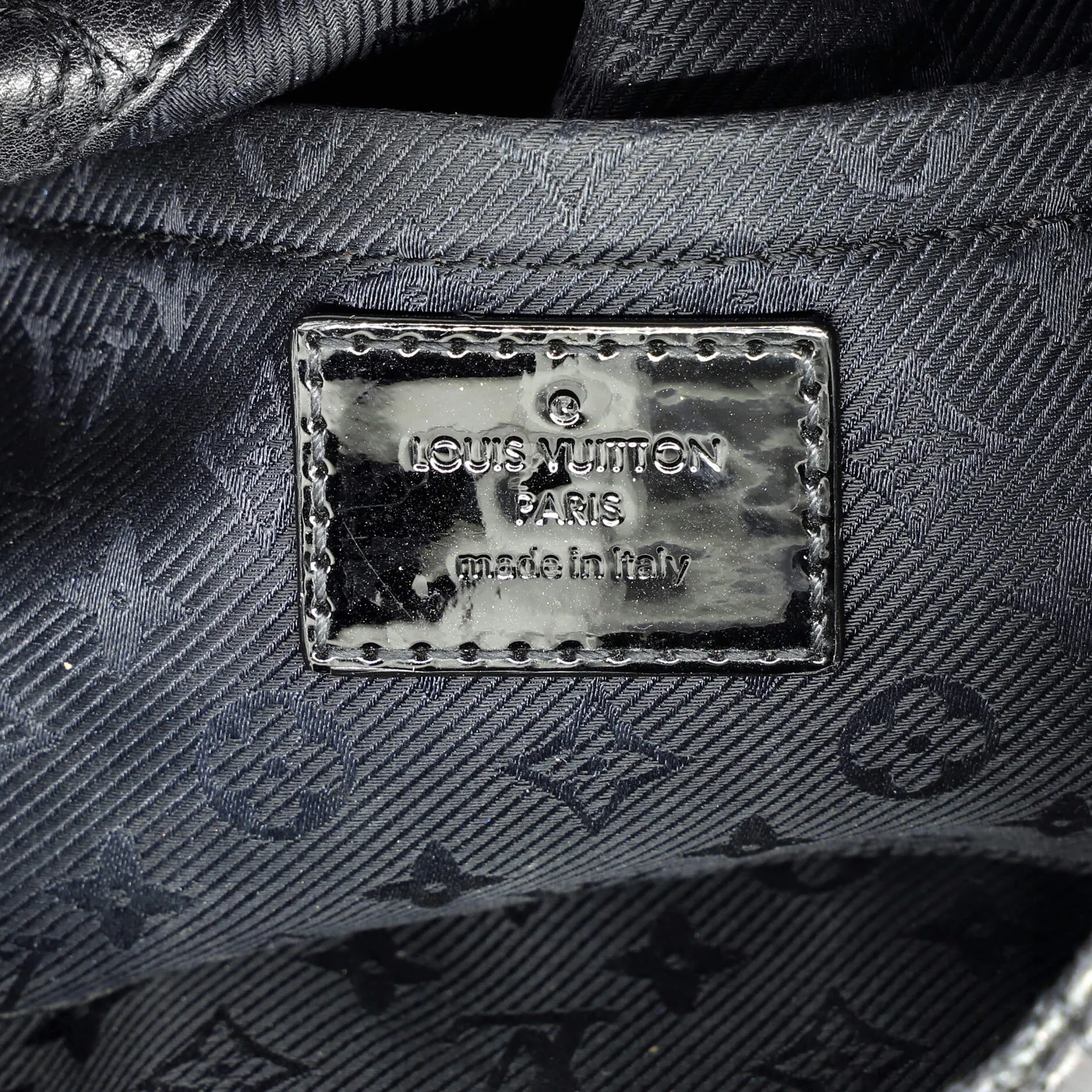 Altair Clutch Quilted Monogram Leather