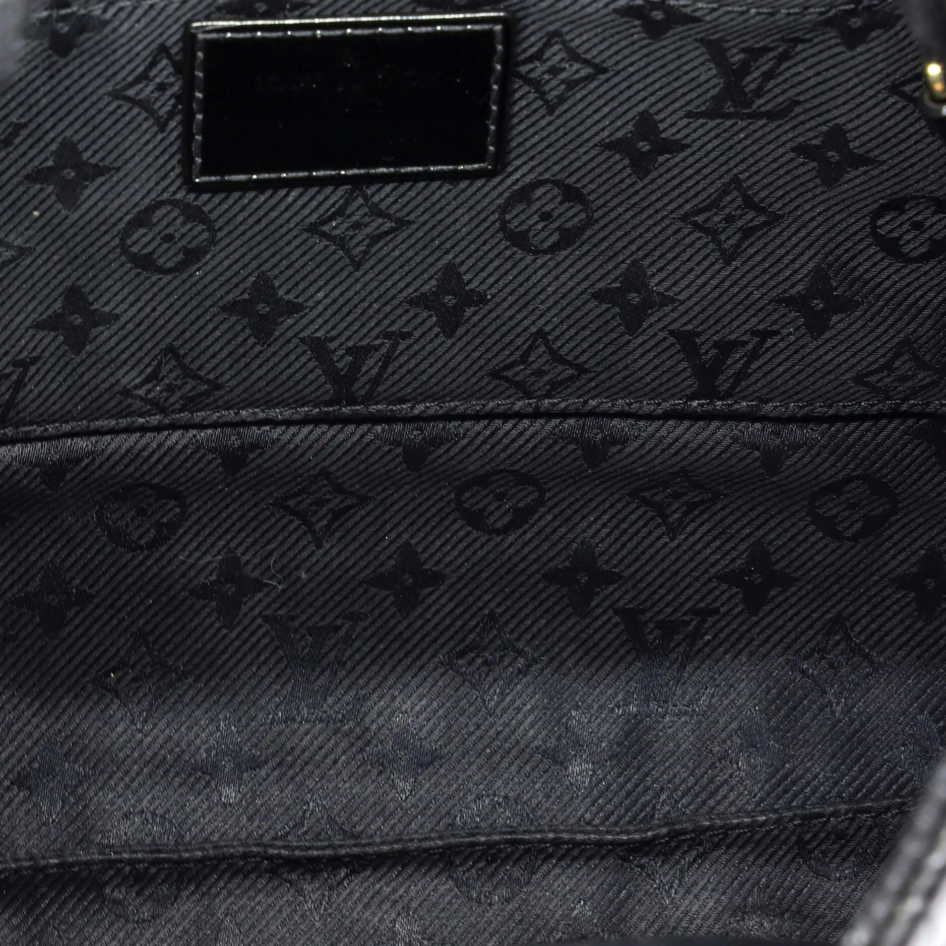 Altair Clutch Quilted Monogram Leather