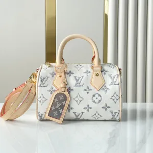 Louis Vuitton SPEEDY BANDOULIRE 20 IN WHITE MONOGRAM JACQUARD FABRIC AND BEIGE CALFSKIN TRIM